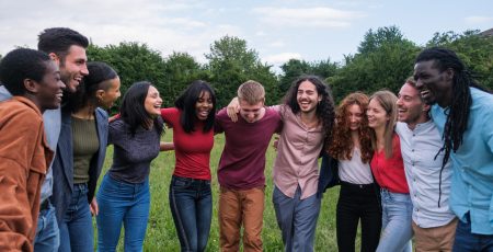 Group of young lifestyle people with different cultures having fun together in the park Group of young lifestyle people with different cultures having fun together in the park